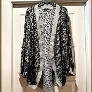 Gigio boutique cardigan. Tried on but too big. Brand new.